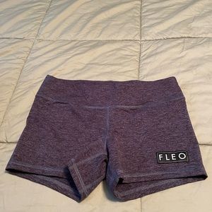 Fleo 3.25 midrise spandex shorts. Never worn. Heathered purple. Size Small.